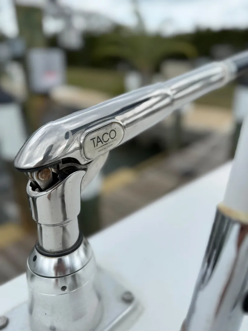 Slide: The Image of Close-up of a Taco marine fitting on a 2004 Palmetto 33 Adventure boat. - 6