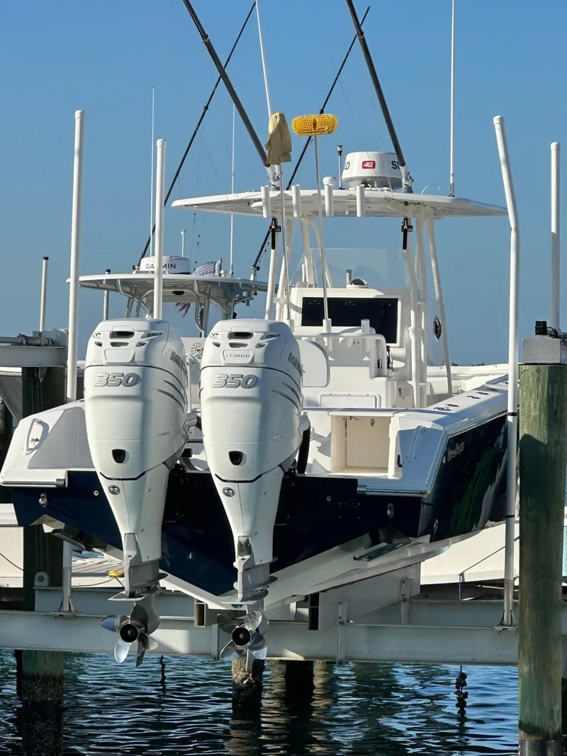 Slide: The Image of 2006 Island Runner 35 boat with dual engines docked at marina. - 3