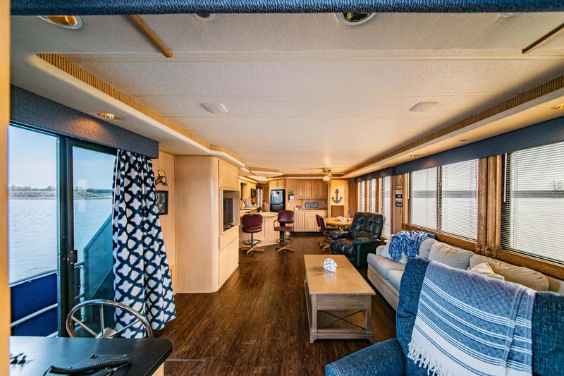 Slide: The Image of Luxurious 1997 Stardust Cruisers 72x16 houseboat interior with cozy seating and elegant decor. - 31