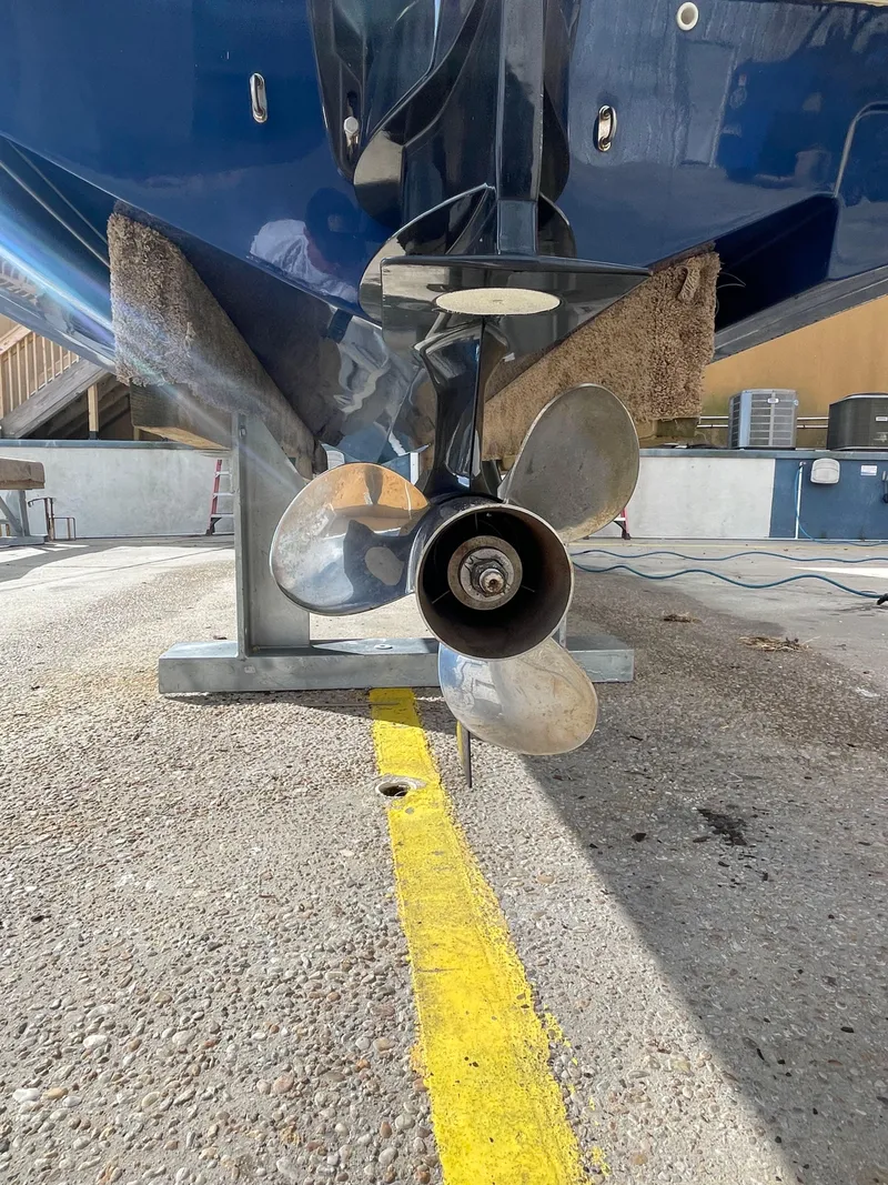 Slide: The Image of Bayliner Element E21 2021 boat propeller on dry dock, close-up view. - 10