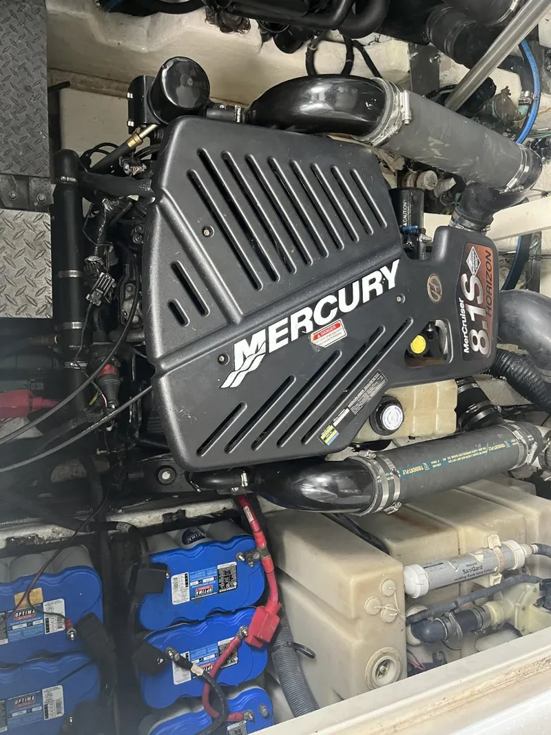 Slide: The Image of Engine compartment of a 2003 Sea Ray 360 Sundancer with Mercury 5.7L engine. - 14