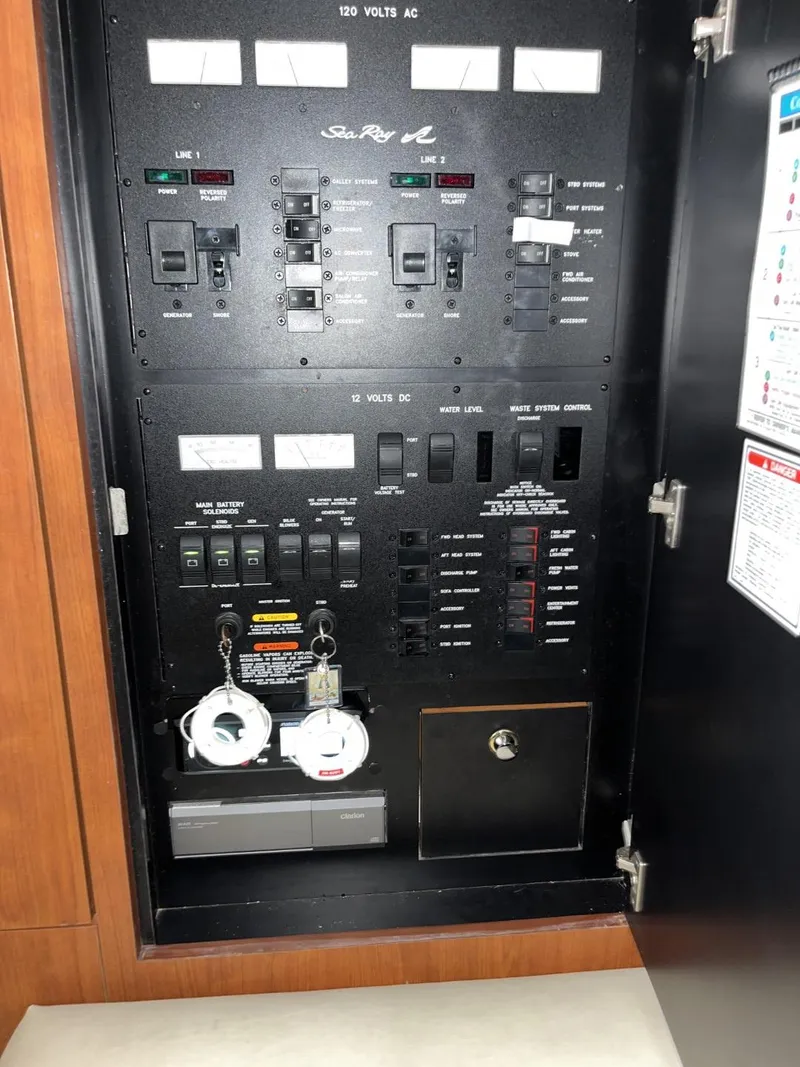 Slide: The Image of Electrical panel of a 2003 Sea Ray 360 Sundancer boat. - 23
