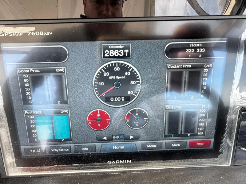 Slide: The Image of Garmin GPS display on 2018 Chaparral 307 SSX showing odometer and engine metrics. - 13