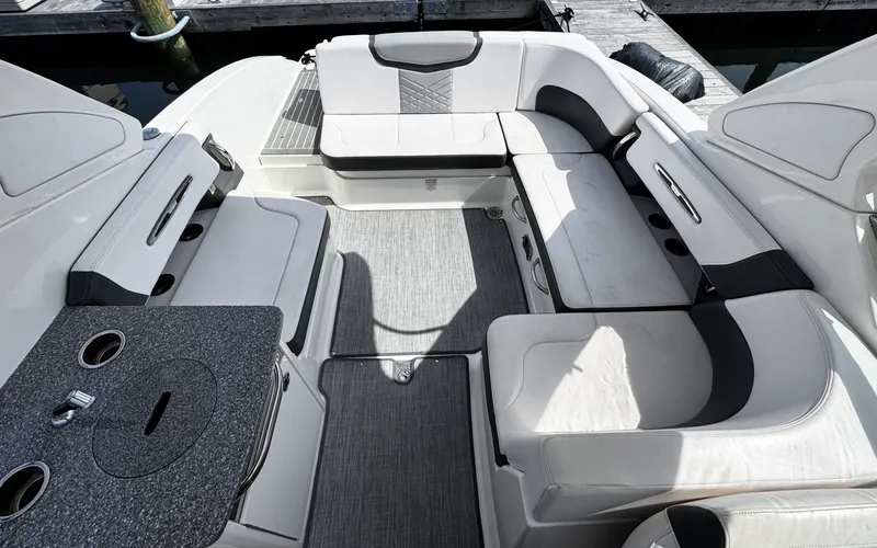 Slide: The Image of 2018 Chaparral 307 SSX boat interior with spacious seating and modern design. - 4