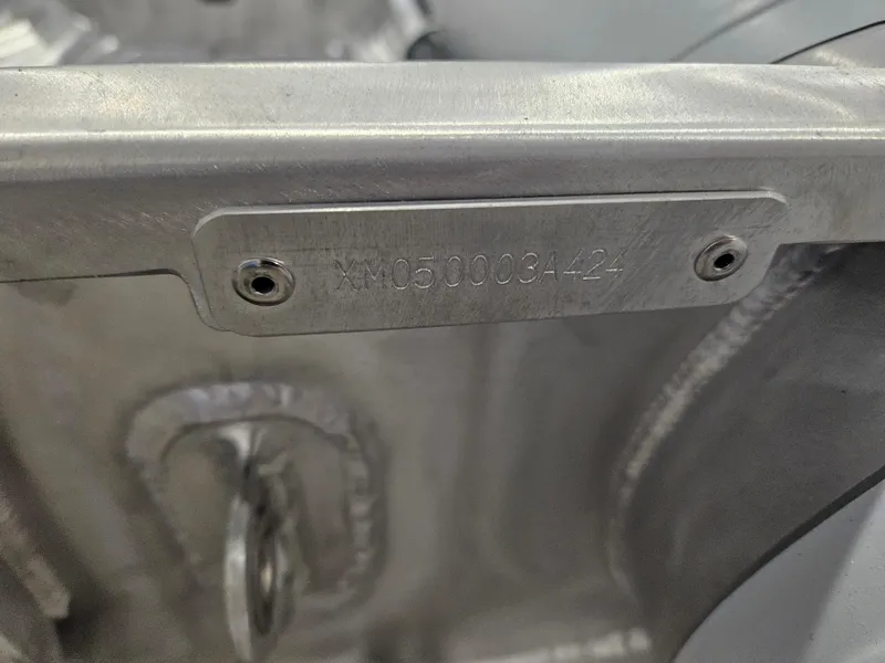 Slide: The Image of 2024 AB Inflatables Lammina 9.5 AL hull identification number plate. - 13