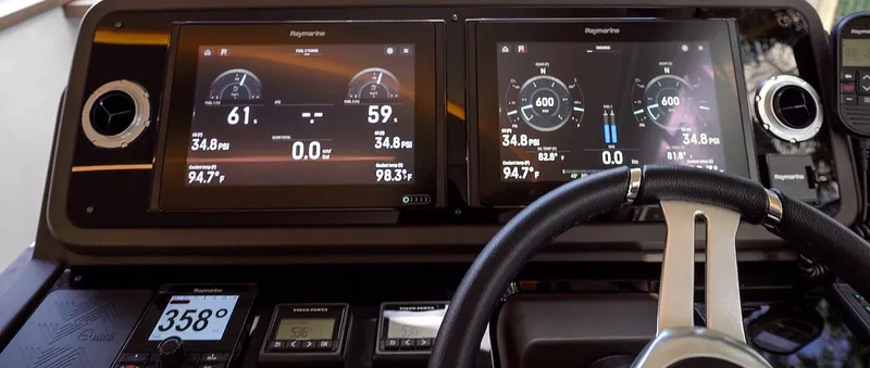 Slide: The Image of Dashboard of 2020 Prestige 520 Fly yacht with advanced navigation displays. - 17