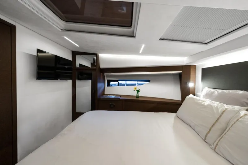 Slide: The Image of Luxurious bedroom interior of 2020 Prestige 520 Fly yacht with modern design. - 20