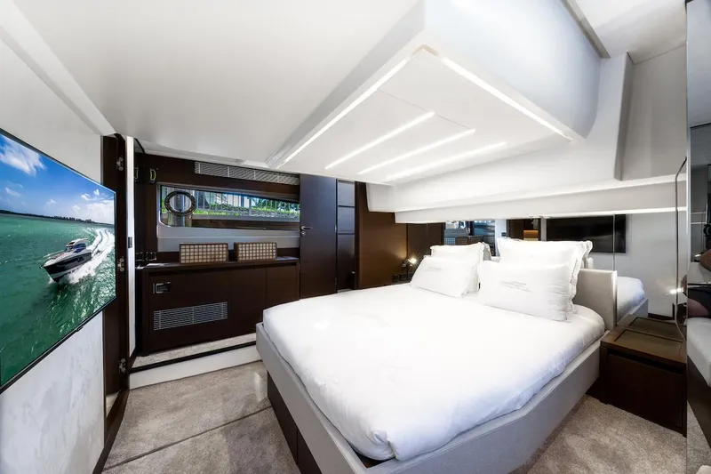Slide: The Image of Luxurious bedroom interior of 2020 Prestige 520 Fly yacht with modern design and elegant furnishings. - 22