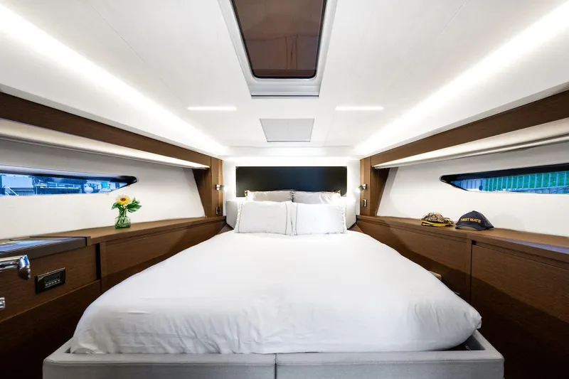 Slide: The Image of Luxurious bedroom interior of 2020 Prestige 520 Fly yacht with modern design and elegant decor. - 25