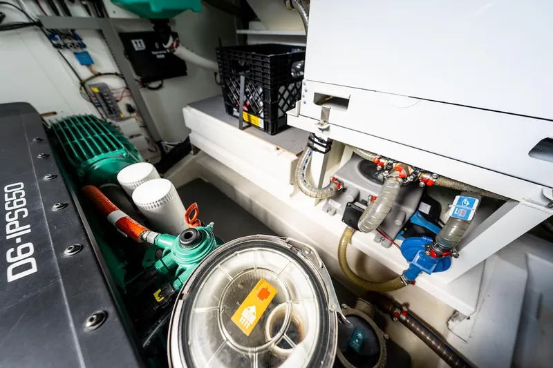Slide: The Image of Engine room of 2020 Prestige 520 Fly yacht, showcasing mechanical components and systems. - 34