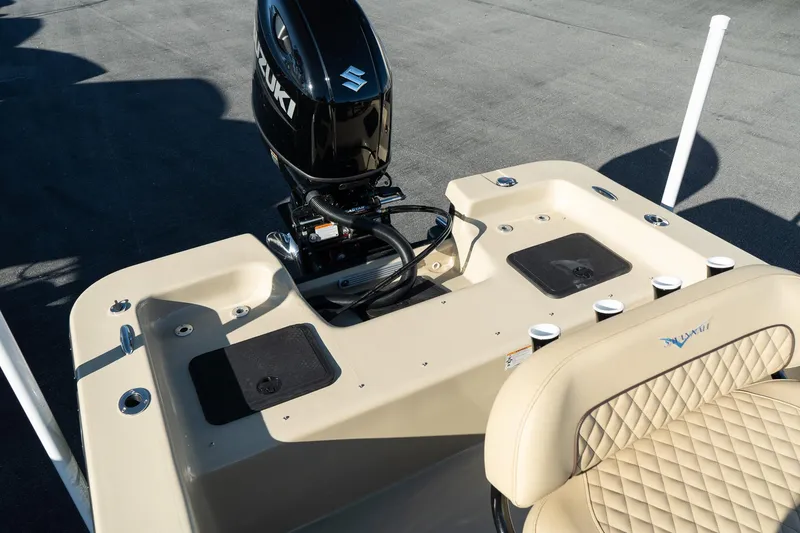 Slide: The Image of 2025 Savannah SS21 Duck boat with Suzuki motor, beige interior, and diamond-stitched seating. - 17