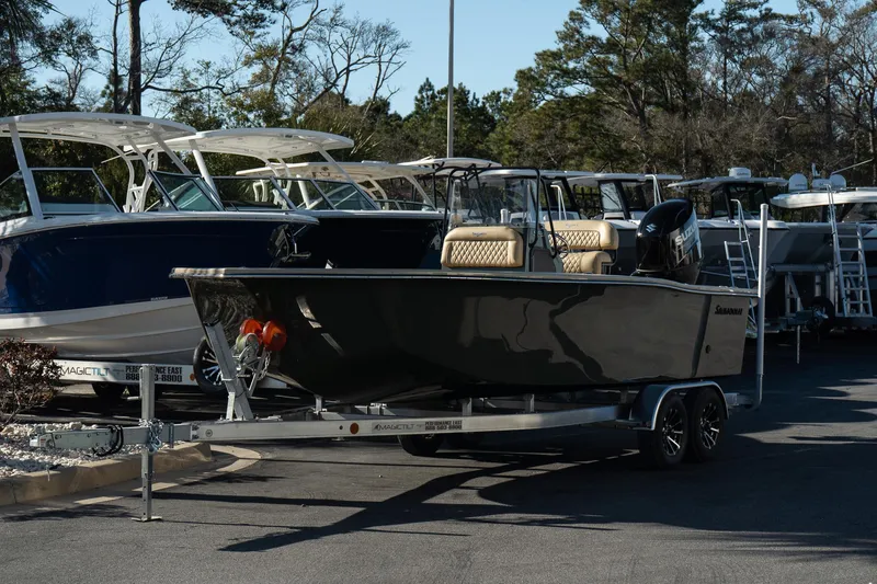 Slide: The Image of 2025 Savannah SS21 Duck boat on trailer in marina parking lot. - 7