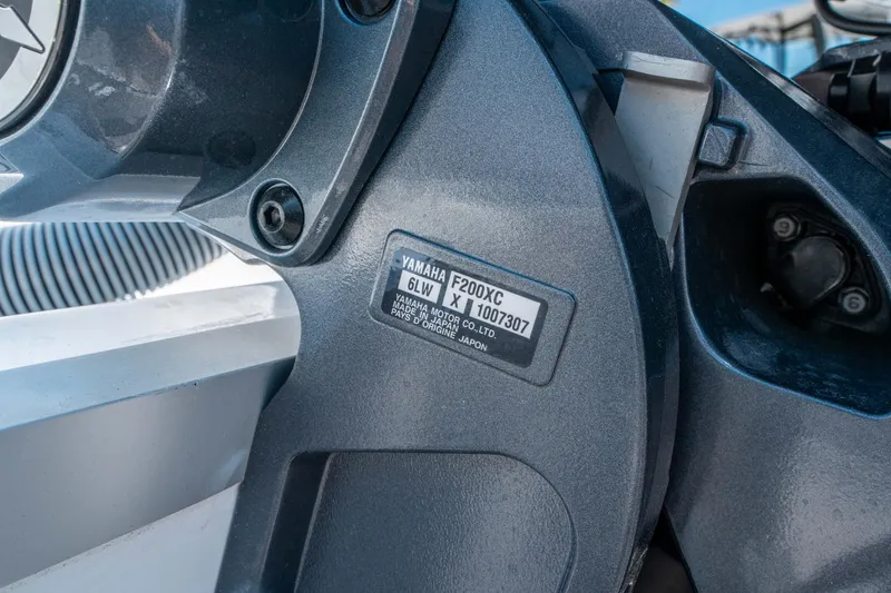 Slide: The Image of Close-up of Yamaha F200XC engine on 2025 Sea Hunt Ultra 229 boat. - 25