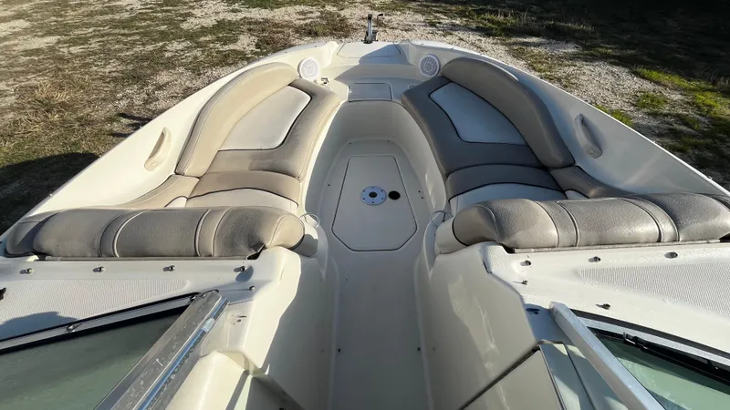 Slide: The Image of 2002 Sea Ray 270 Sundeck boat interior with steering wheel and dashboard controls. - 11
