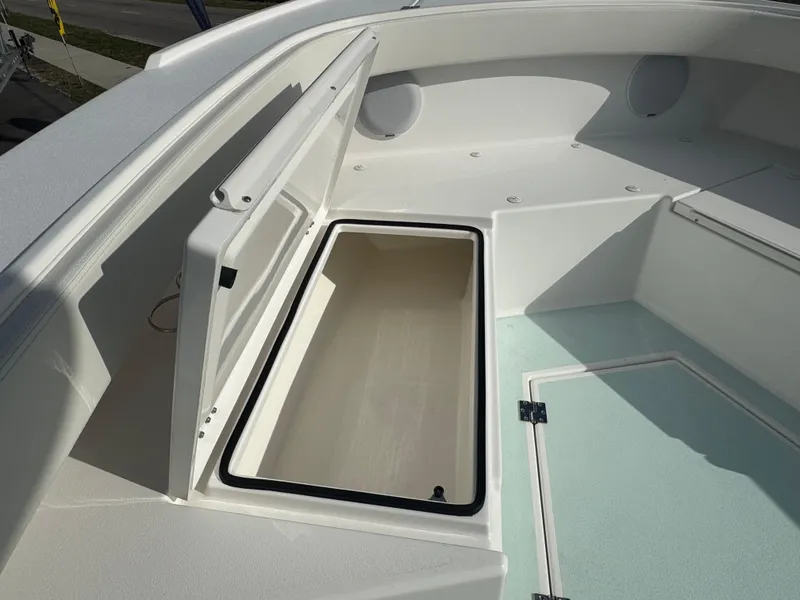 Slide: The Image of Open storage compartment on 2023 Albury Brothers 27 boat deck. - 10