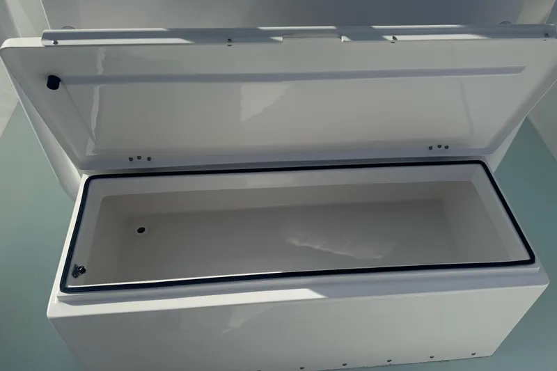 Slide: The Image of Open storage compartment on 2023 Albury Brothers 27 boat, showcasing interior space. - 15