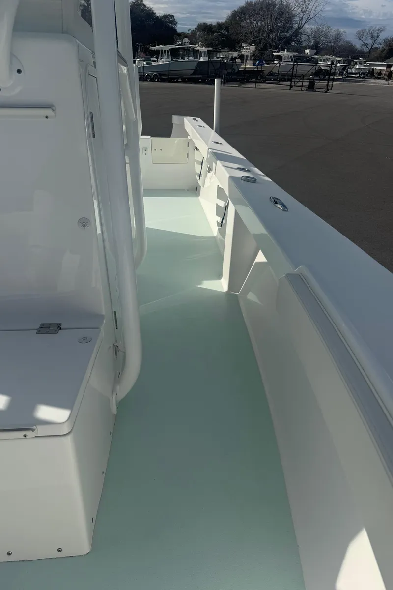 Slide: The Image of 2023 Albury Brothers 27 boat deck, showcasing sleek design and spacious layout. - 16