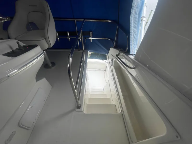 Slide: The Image of Interior view of 2006 Silverton 42 Convertible yacht, featuring stairs and seating area. - 22