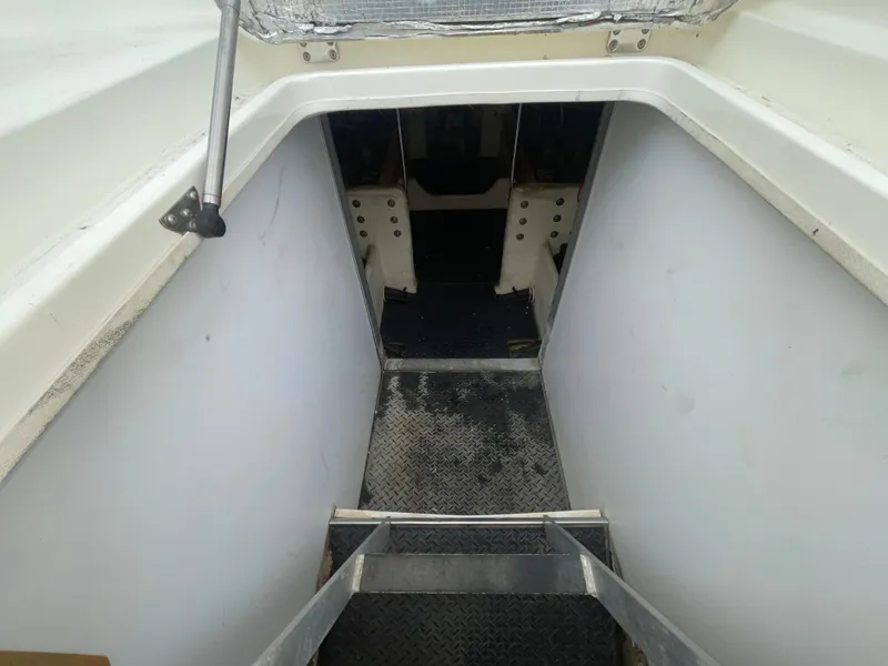 Slide: The Image of Stairway leading to the engine room of a 2006 Silverton 42 Convertible yacht. - 46
