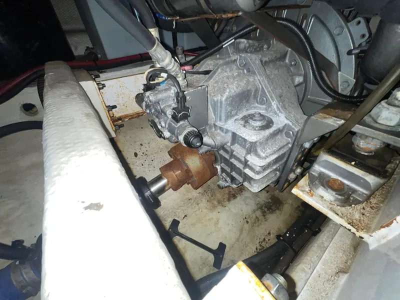 Slide: The Image of Engine compartment of a 2006 Silverton 42 Convertible boat, showing mechanical components. - 49