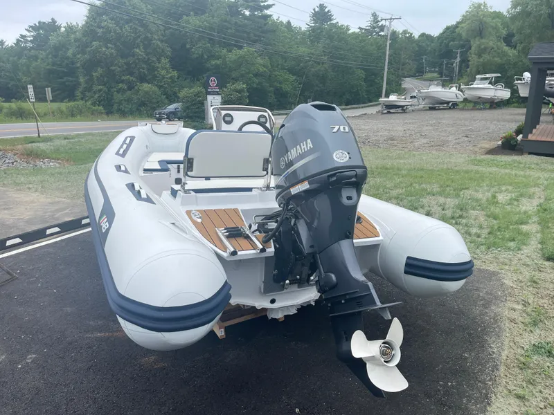 Slide: The Image of 2025 AB Inflatables Alumina 15 ALX boat with Yamaha motor, parked outdoors. - 19