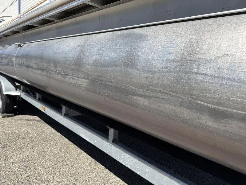 Slide: The Image of 2006 Sun Tracker Party Cruiser 32 pontoon boat on trailer, side view. - 26