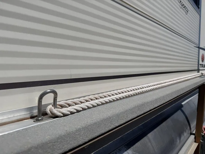 Slide: The Image of 2006 Sun Tracker Party Cruiser 32 with rope detail on deck. - 30