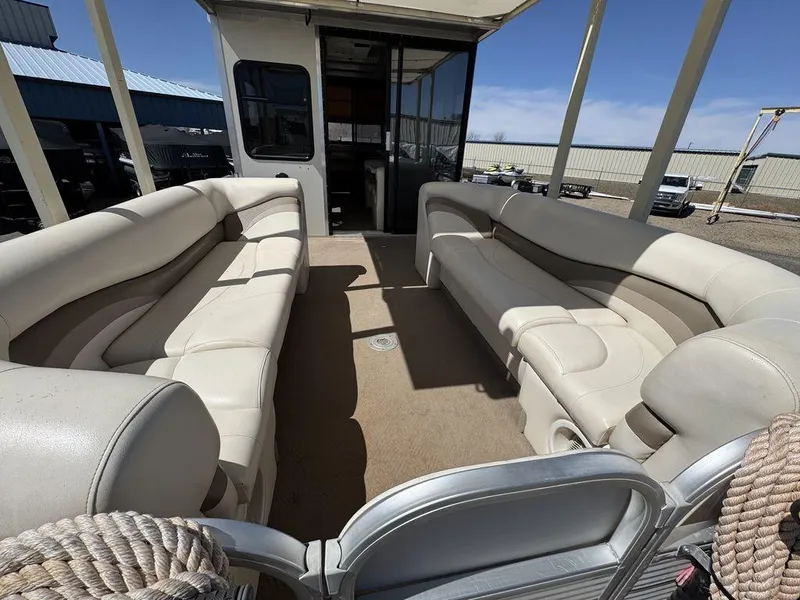Slide: The Image of 2006 Sun Tracker Party Cruiser 32 interior with spacious seating and modern design. - 42