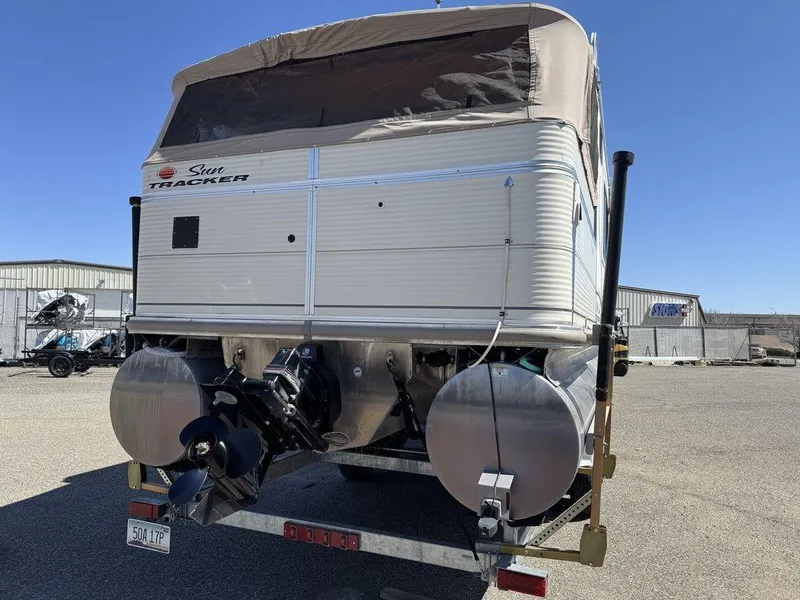 Slide: The Image of 2006 Sun Tracker Party Cruiser 32 pontoon boat on trailer, rear view. - 5