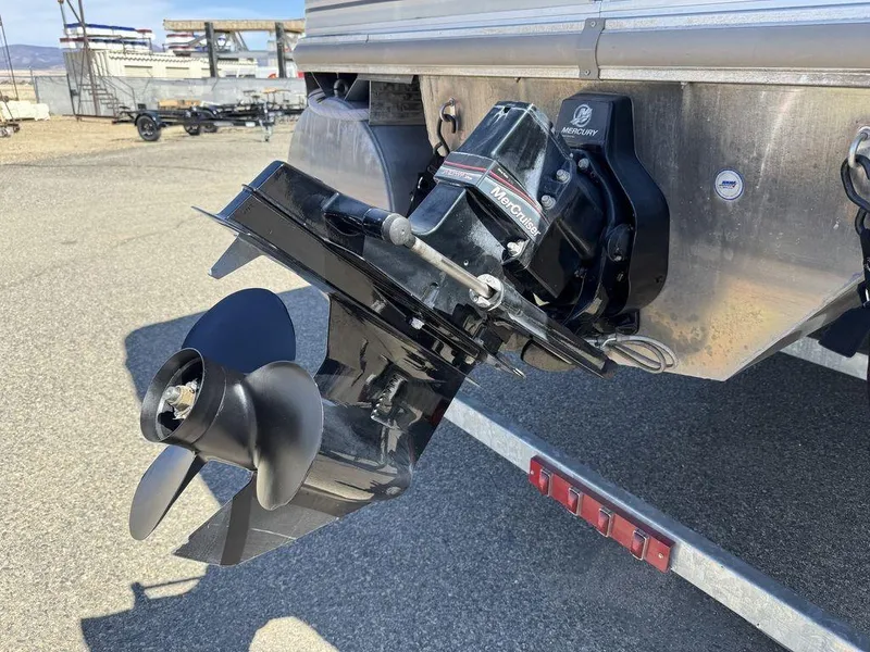 Slide: The Image of 2006 Sun Tracker Party Cruiser 32 boat motor and propeller on trailer. - 8