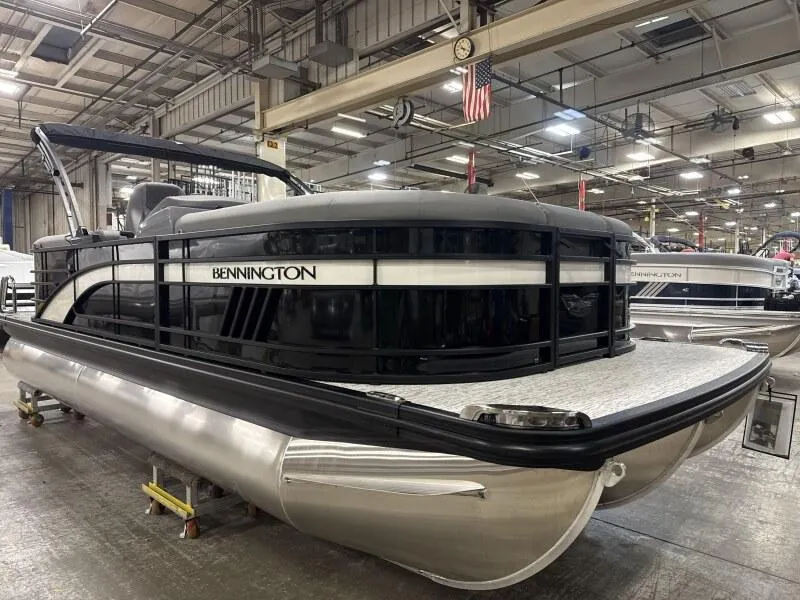 The Image of 2025 Bennington 22 LSRSE pontoon boat, sleek design, black and silver finish. - 1