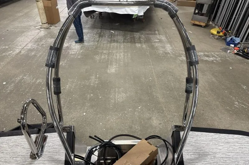 Slide: The Image of 2025 Bennington 22 LSRSE boat frame in a workshop setting. - 15