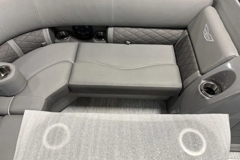 Slide: The Image of Luxurious seating on 2025 Bennington 22 LSRSE boat with quilted upholstery and cup holders. - 17