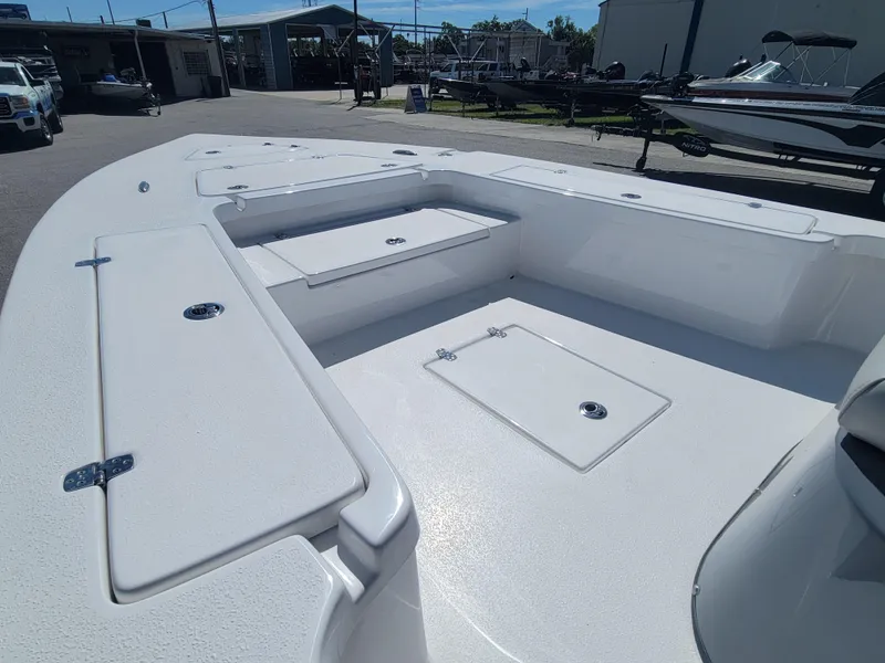 Slide: The Image of 2025 Blazer Bay 2420 GTS Deluxe boat deck with storage compartments. - 11