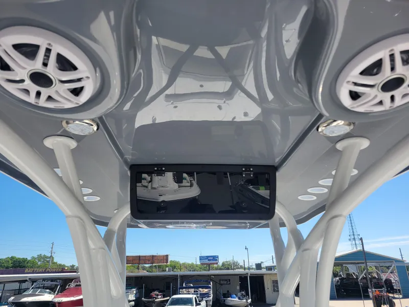 Slide: The Image of 2025 Blazer Bay 2420 GTS Deluxe boat interior with speakers and control panel. - 17