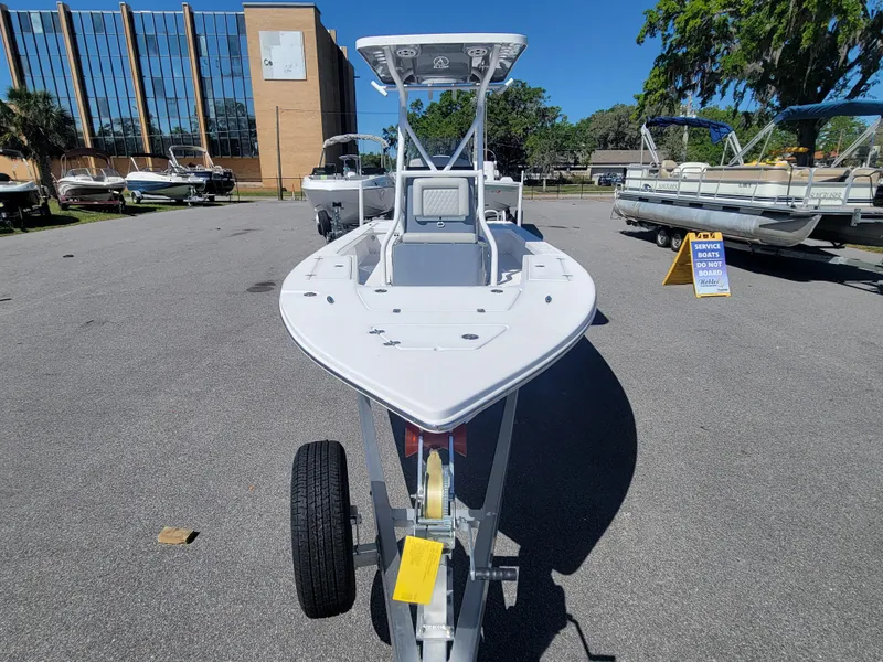 Slide: The Image of 2025 Blazer Bay 2420 GTS Deluxe boat on trailer in outdoor showroom. - 6