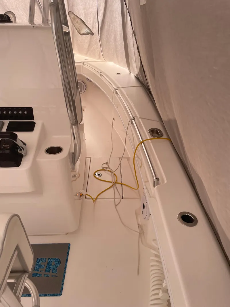 Slide: The Image of 2021 Contender Tournament boat interior with console and seating area. - 4