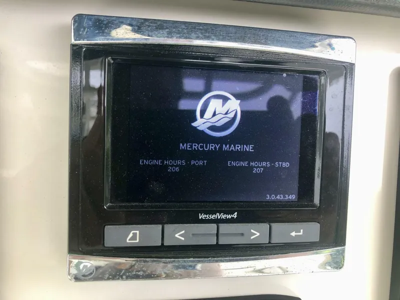 Slide: The Image of Mercury Marine VesselView4 display on 2016 Boston Whaler OUTRAGE, showing engine hours. - 14