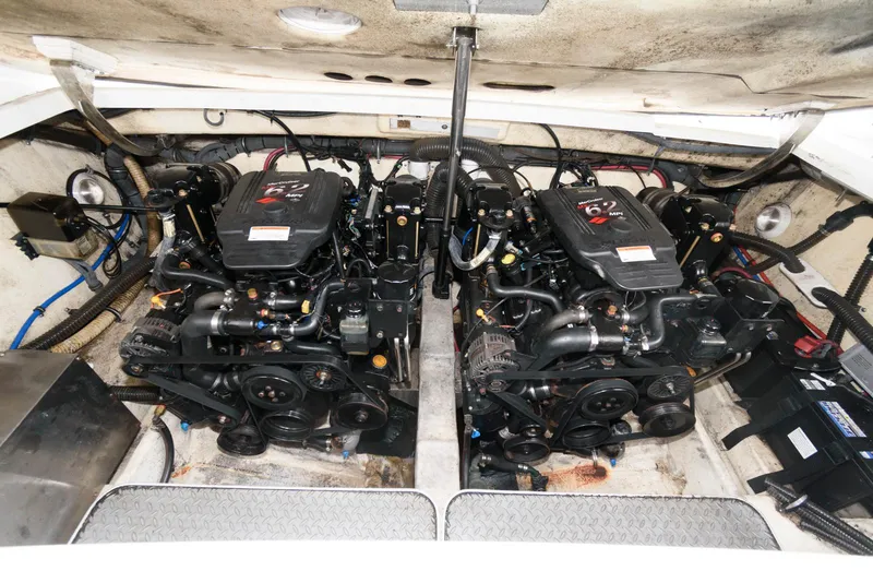 Slide: The Image of Twin engines in a 2007 Formula 330 Sun Sport boat, showcasing powerful marine engineering. - 14