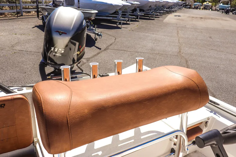 Slide: The Image of Avid 20 ROGUE CC 2025 boat with leather seating and powerful outboard motor. - 17