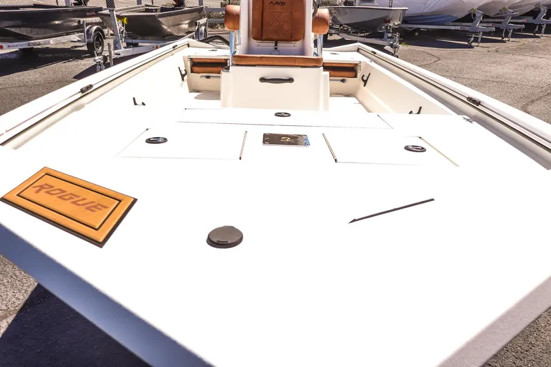 Slide: The Image of 2025 Avid 20 ROGUE CC boat deck with storage compartments and seating. - 25