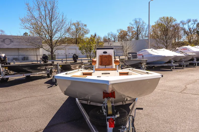 Slide: The Image of 2025 Avid 20 ROGUE CC boat on trailer in outdoor lot. - 8