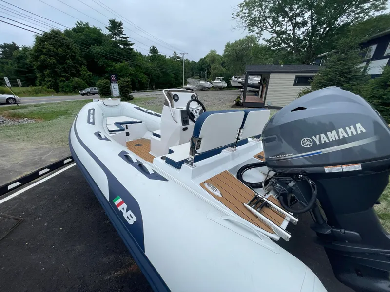 Slide: The Image of 2025 AB Inflatables Alumina 13 ALX with Yamaha 40HP outboard motor, rear view. - 2