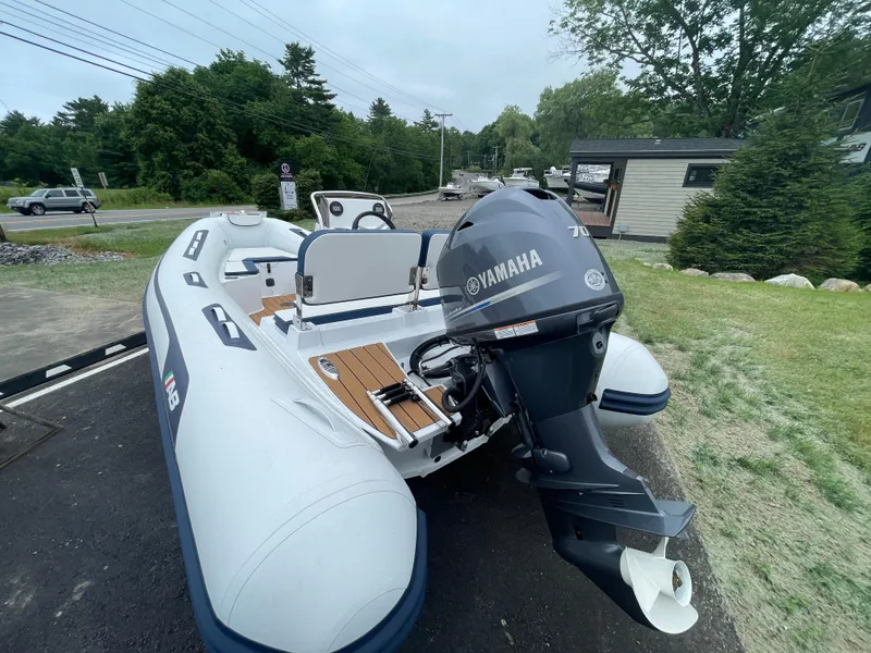 Slide: The Image of 2025 AB Inflatables Alumina 13 ALX with Yamaha 40 engine, parked outdoors. - 3