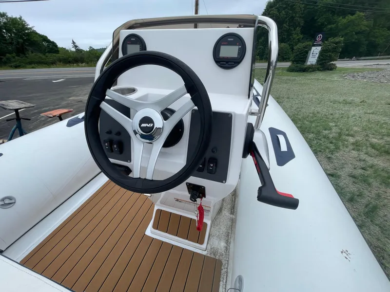 Slide: The Image of 2025 AB Inflatables Alumina 13 ALX boat interior with seating and console. - 7