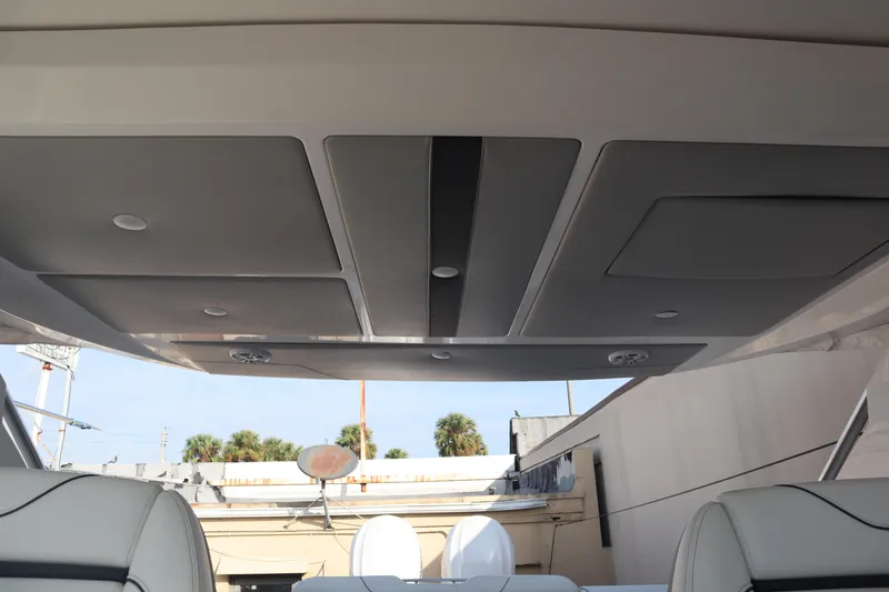 Slide: The Image of Interior view of 2022 Regal LX36 boat ceiling with modern design elements. - 43