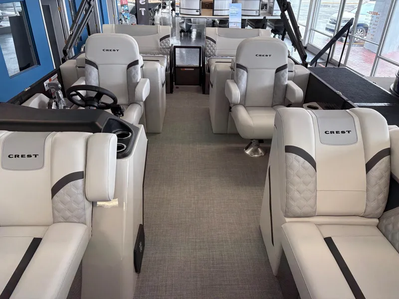 Slide: The Image of 2025 Crest 220SLRC boat interior with luxurious seating and modern design. - 2