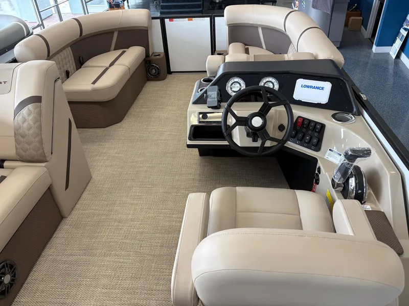 Slide: The Image of Luxurious interior of 2025 Crest 20L boat with plush seating and modern dashboard. - 5