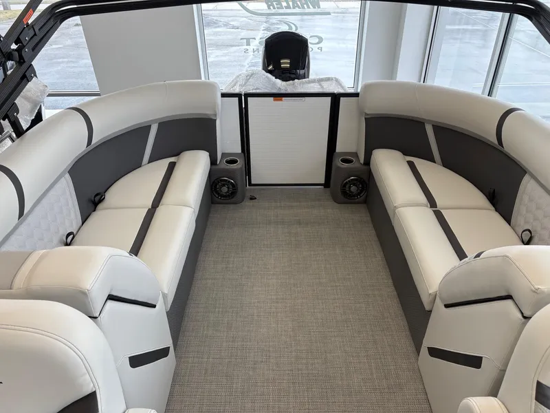 Slide: The Image of Interior of 2025 Crest 240SLC boat with plush seating and modern design. - 5