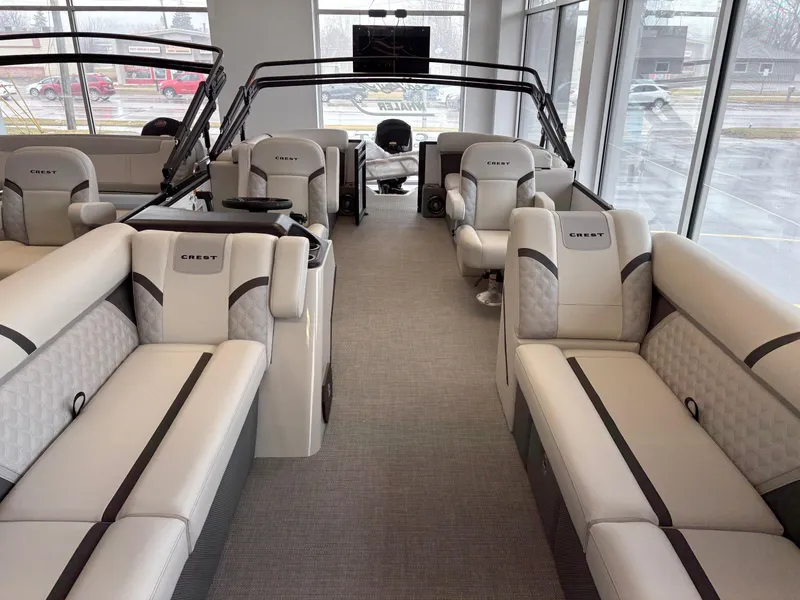 Slide: The Image of Luxurious interior of 2025 Crest 240SLC pontoon boat with plush seating and modern design. - 6